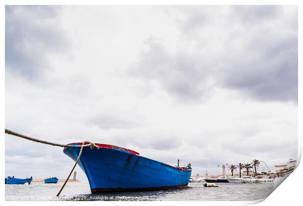 Small boat moored to Bari port, Italy, during a storm at sea. Print by Joaquin Corbalan