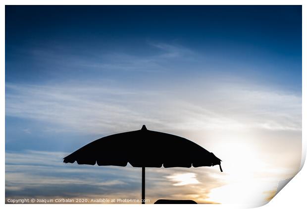 Silhouette of beach umbrella against backlight on a hot summer day. Print by Joaquin Corbalan