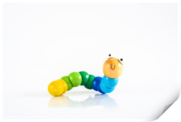 Toy caterpillar with smile, to illustrate concepts of infant intestinal health. Print by Joaquin Corbalan