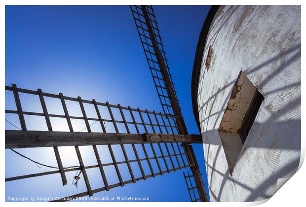 Traditional windmill of La Mancha, in Spain, protagonist of the famous novel Don Quixote. Print by Joaquin Corbalan