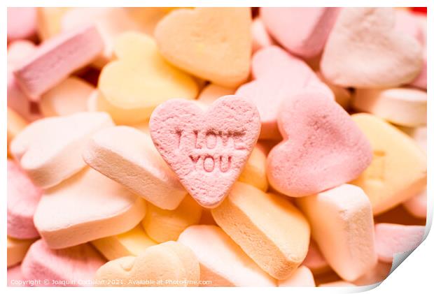 Love word engraved in a sweet romantic heart-shaped candy to giv Print by Joaquin Corbalan