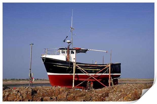 Red and black fishing boat on Lindisfarne Print by Simon Marshall