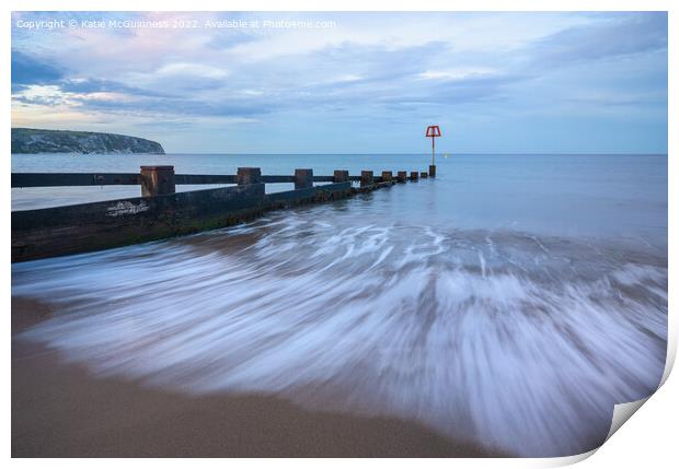 Swanage beach sunset Print by Katie McGuinness