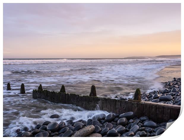 Sunrise beach groynes Print by Tony Twyman