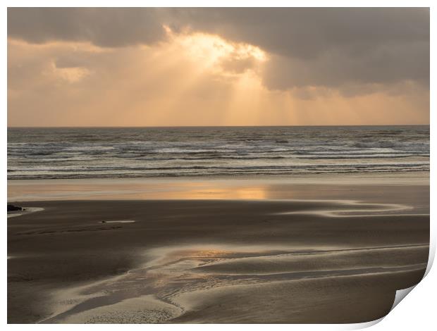 Ray of sunlight through the clouds at Westward Ho! Print by Tony Twyman