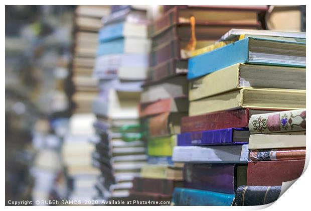Close-up of stacks of old books, selective focus. Print by RUBEN RAMOS