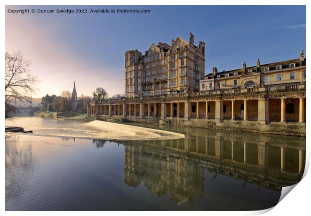 Empire hotel in Bath reflected in the River Avon early morning Print by Duncan Savidge