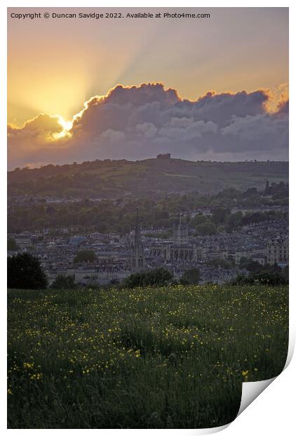 The sun setting behind a cloud over Bath Print by Duncan Savidge