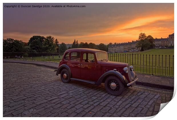 Royal Crescent Bath at sunset with an old fashioned car Print by Duncan Savidge