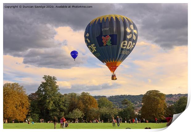 Hot air balloon lifting off from Royal Victoria Park Bath Print by Duncan Savidge