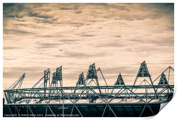 Airplane flying over the 2012 Olympic Stadium in Stratford, London, England, UK Print by Mehul Patel