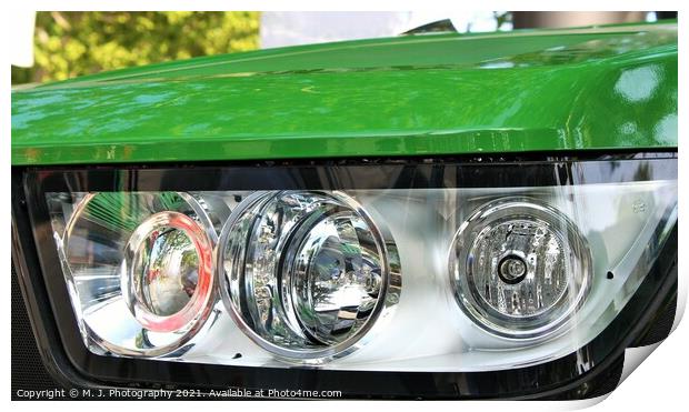 headlight on the front  of John Deere tractor Print by M. J. Photography