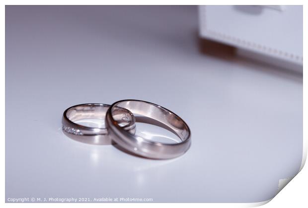 wedding rings isolated on white Print by M. J. Photography