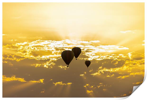 some hot air balloons in the sky with orange sunrise clouds Print by David Galindo