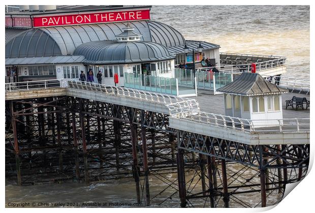 View along Cromer pier on the North Norfolk coast Print by Chris Yaxley