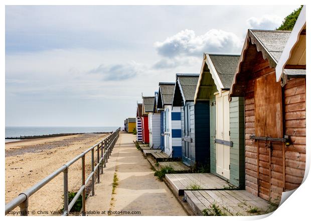 Wooden beach huts Print by Chris Yaxley