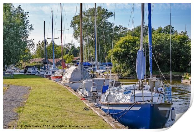 Sailing boats moored in Hickling, Norfolk Broads Print by Chris Yaxley