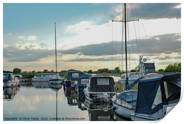 Boats moored up in Thurne Dyke Print by Chris Yaxley