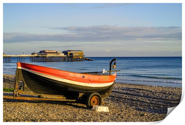 Crab fishing boat at sunrise on Cromer beach, Norfolk Print by Chris Yaxley