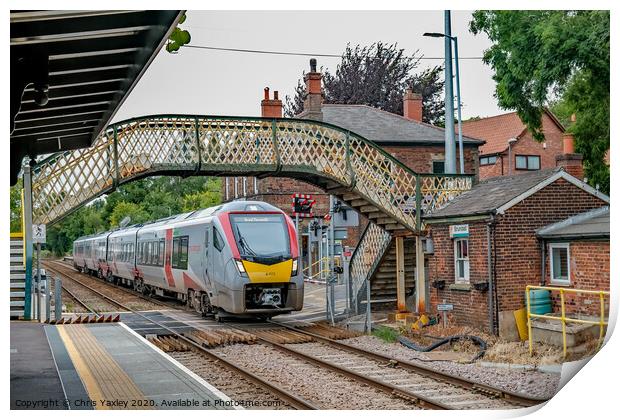 Commuter train in Brundall Gardens station Print by Chris Yaxley