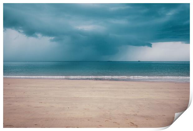 Unsettled dark sky over the beach in Brittany Print by Laurent Renault