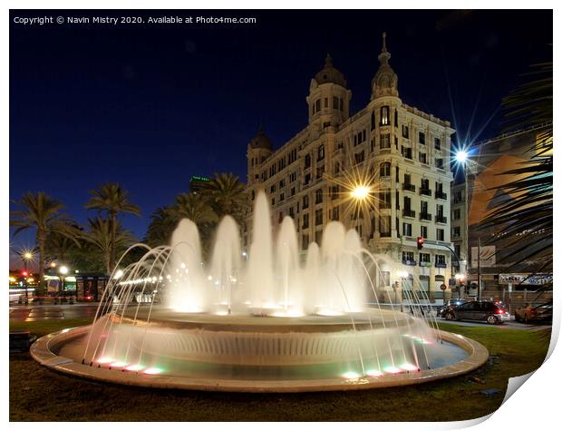A fountain lit up at night, Alicante, Spain Print by Navin Mistry