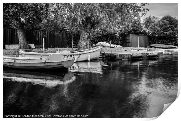 Boats moored in Llangorse Lake, Brecon Beacons Print by Gordon Maclaren