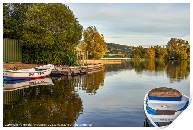 Boats moored in Llangorse Lake Brecon Beacons Print by Gordon Maclaren