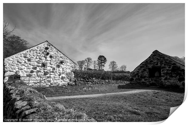 Stone dwellings at St Fagans Print by Gordon Maclaren
