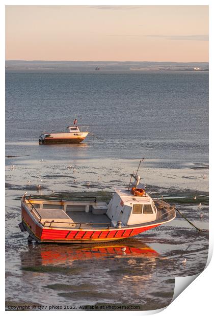 Moored boat illuminated by the rays of the setting sun on the sh Print by Q77 photo