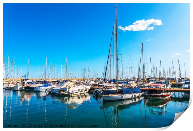 Beautiful luxury yachts and motor boats anchored i Print by Q77 photo