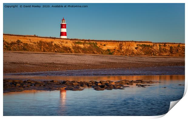 Morning light on Happisburgh Beach Print by David Powley