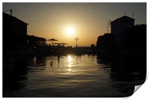 Sunset over the harbour pier Print by Theo Spanellis