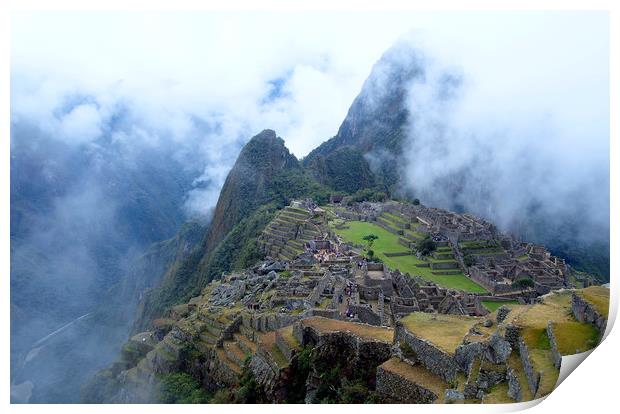 Machu Picchu in the mist Print by Theo Spanellis