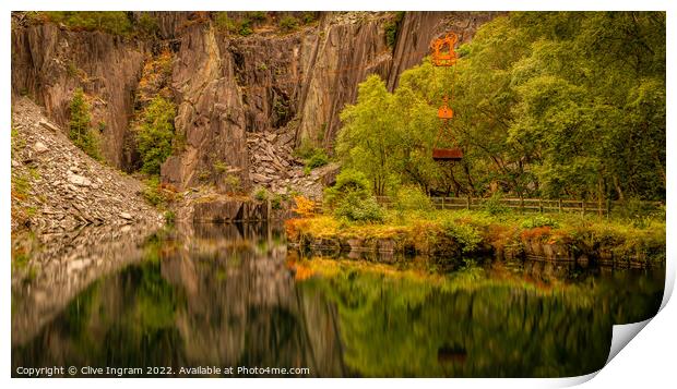 Deep reflections of a Welsh slate quarry Print by Clive Ingram