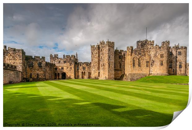 Majestic Alnwick Castle on a Moody Autumn Day Print by Clive Ingram