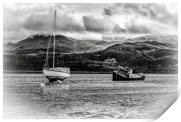 Boats at low tide with mountain backdrop Print by Clive Ingram