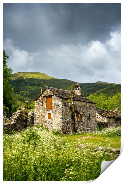 A rustic Spanish stone-walled cottage Print by Stephen Rennie
