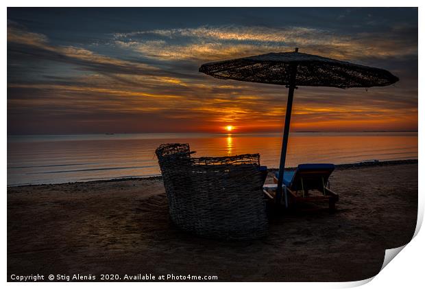 a shelter and loungers at the beach in the sunset Print by Stig Alenäs
