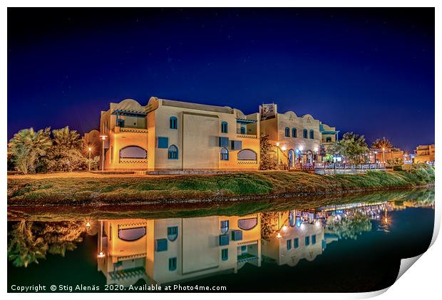 Egyptian houses at night reflecting in the lagoon Print by Stig Alenäs