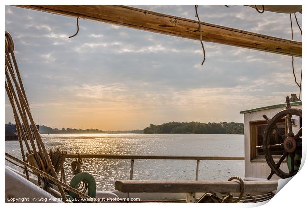 sunset seen through the rig on a sailboat south of Print by Stig Alenäs