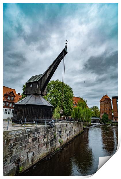 Old crane at the Historic city of Luneburg Germany - CITY OF LUENEBURG, GERMANY - MAY 10, 2021 Print by Erik Lattwein