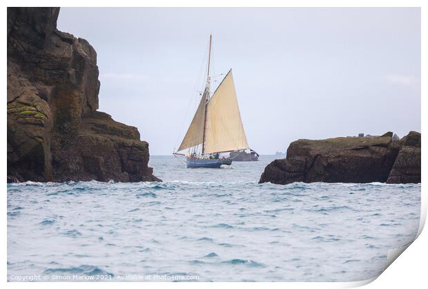 Yacht sailing between rocks in the Isles of Scilly Print by Simon Marlow