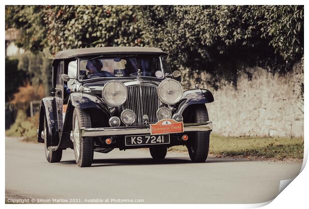 Classic Jaguar travelling through Hopton Castle Print by Simon Marlow