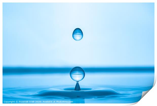 Water drop splashing into blue water surface Print by Przemek Iciak