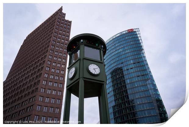 Historic clock on Potsdamer Platz in Berlin Print by Luis Pina