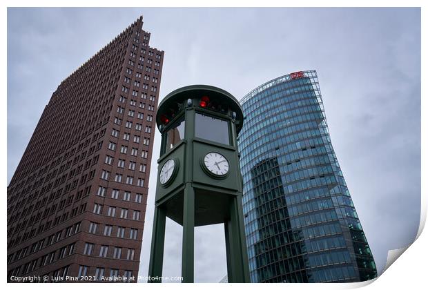Historic clock on Potsdamer Platz in Berlin Print by Luis Pina