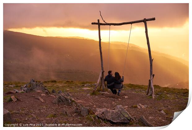 Romantic couple swinging on a Swing baloico in Lousa mountain, Portugal at sunset Print by Luis Pina