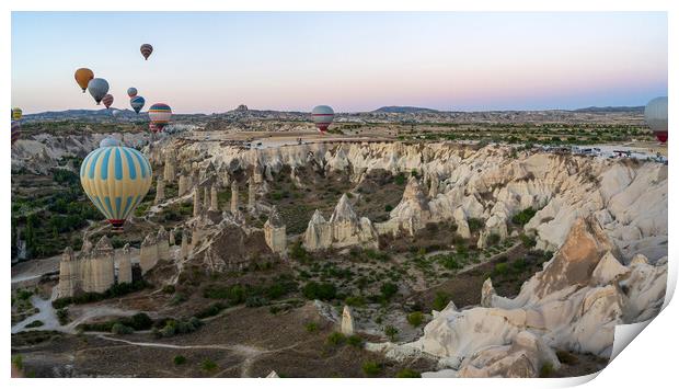 Hot Air balloons flying tour over Mountains landscape geological rock formation in autumn during sunrise in Cappadocia, Goreme National Park, Turkey nature background Print by Arpan Bhatia