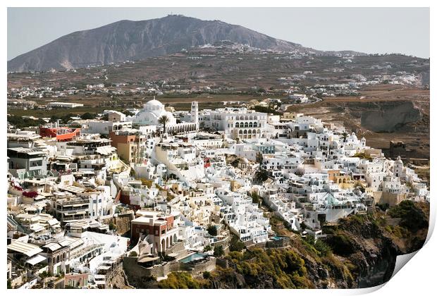 Drone Aerial shot of Thira village in Santorini, Oia located in Greece against mountains. Famous greek island cityscape Print by Arpan Bhatia
